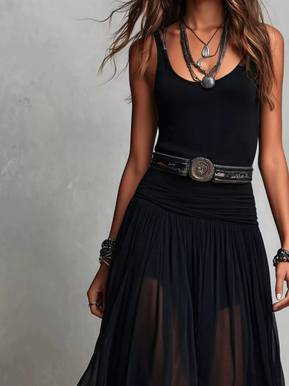 Trendsi black sleeveless maxi dress with layered necklaces and decorative belt