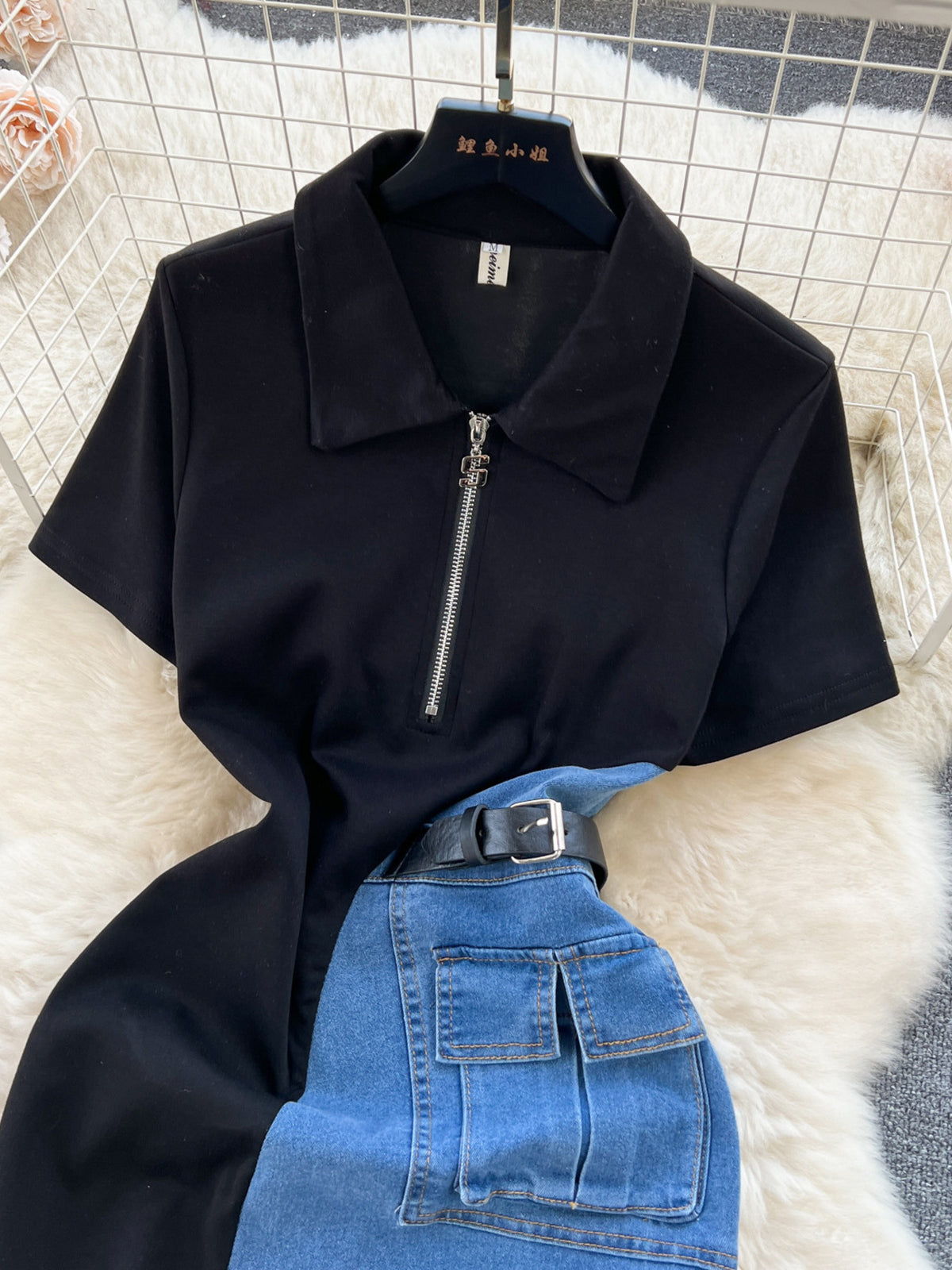 Black and blue dress in denim with a zipper collar and pocket detail from Erina's Boutique