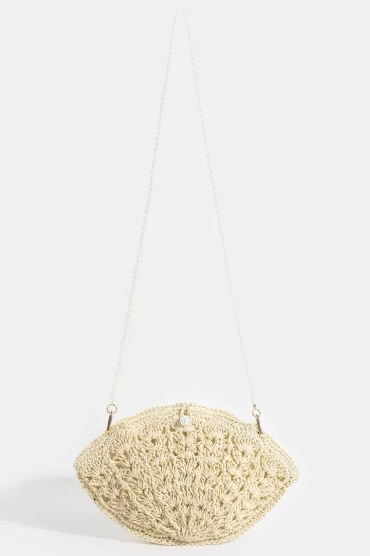 Erina's Boutique straw coach bag in natural woven design with pearl detail and long strap
