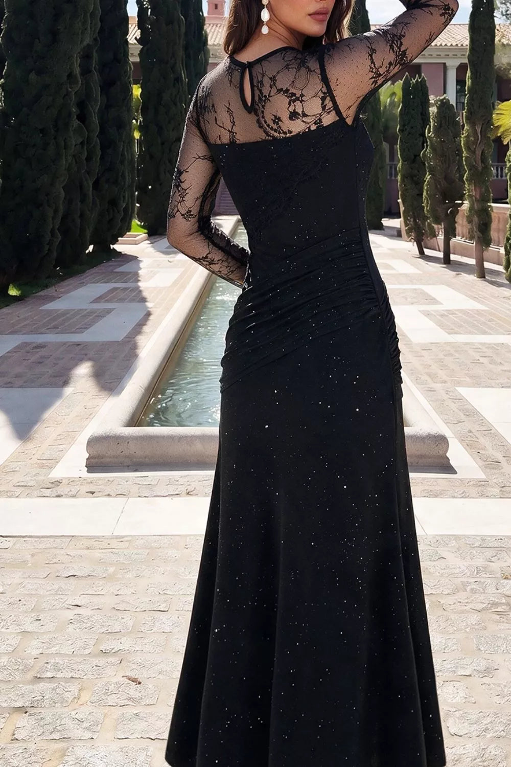 Erina's Boutique black maxi dress with lace long sleeves and ruched detailing