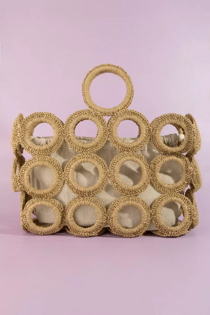 Handmade woven handbag coach bag with circular handles and beige fabric lining