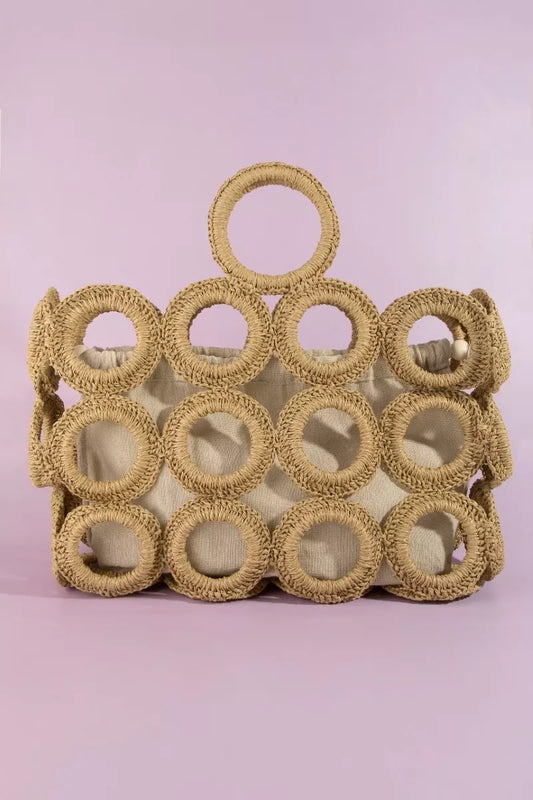 Handmade woven handbag coach bag with circular handles and beige fabric lining
