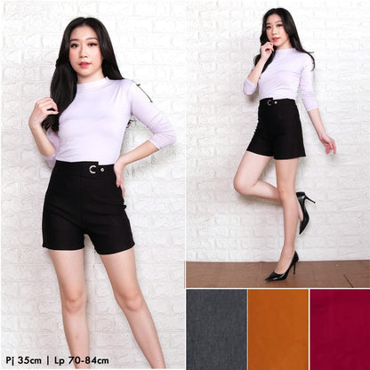 Woman wearing black Korean style short pants for women paired with a white long sleeve top from Erina's Boutique